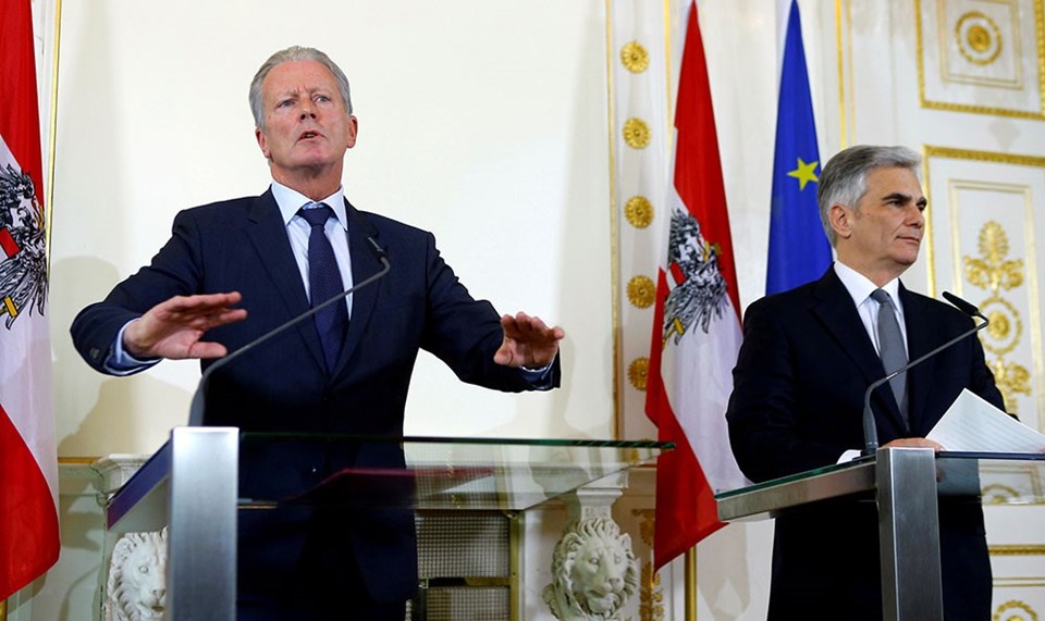 Yeni Başbakan Reinhold Mitterlehner (solda) ve Werner Faymann