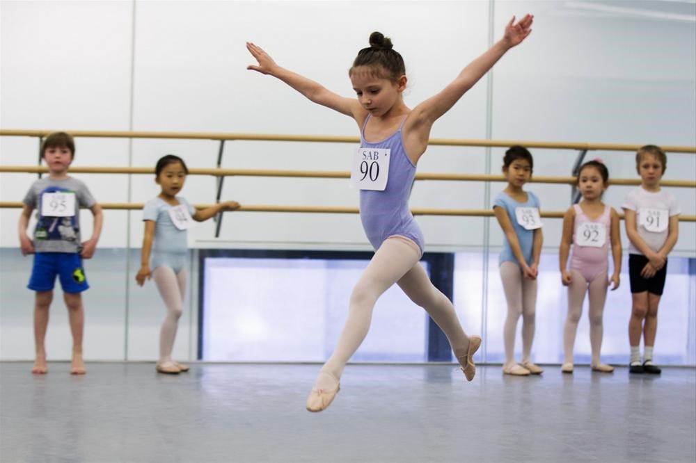 Three cute tiny teen ballerinas photo