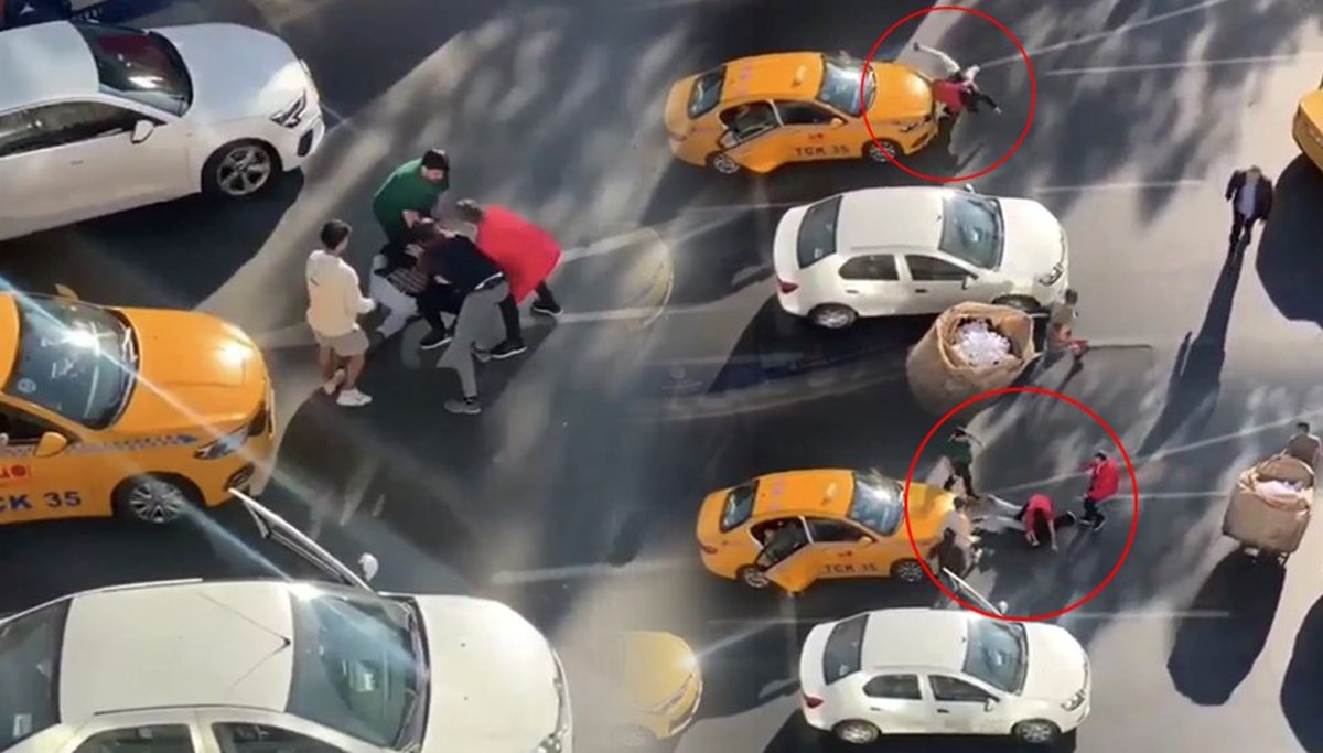 İki taksicinin müşteri kavgası: Caddeyi boks ringine çevirdiler