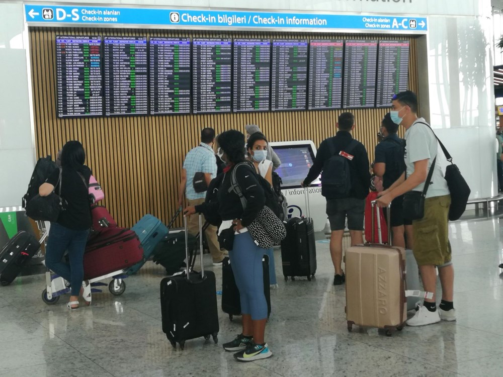 İstanbul'un havalimanlarında bayram dönüşü yoğunluğu: Pandemi döneminin rekoru bekleniyor - 15
