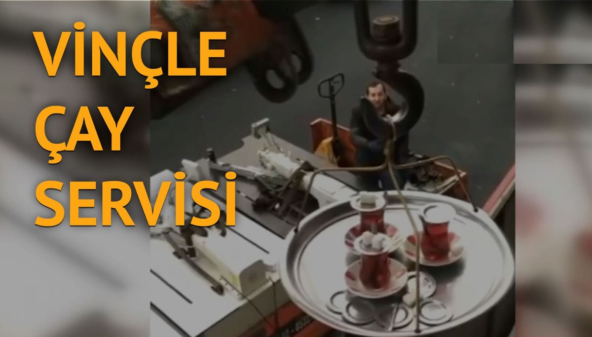 İşçilere vinç ile çay ikram etti