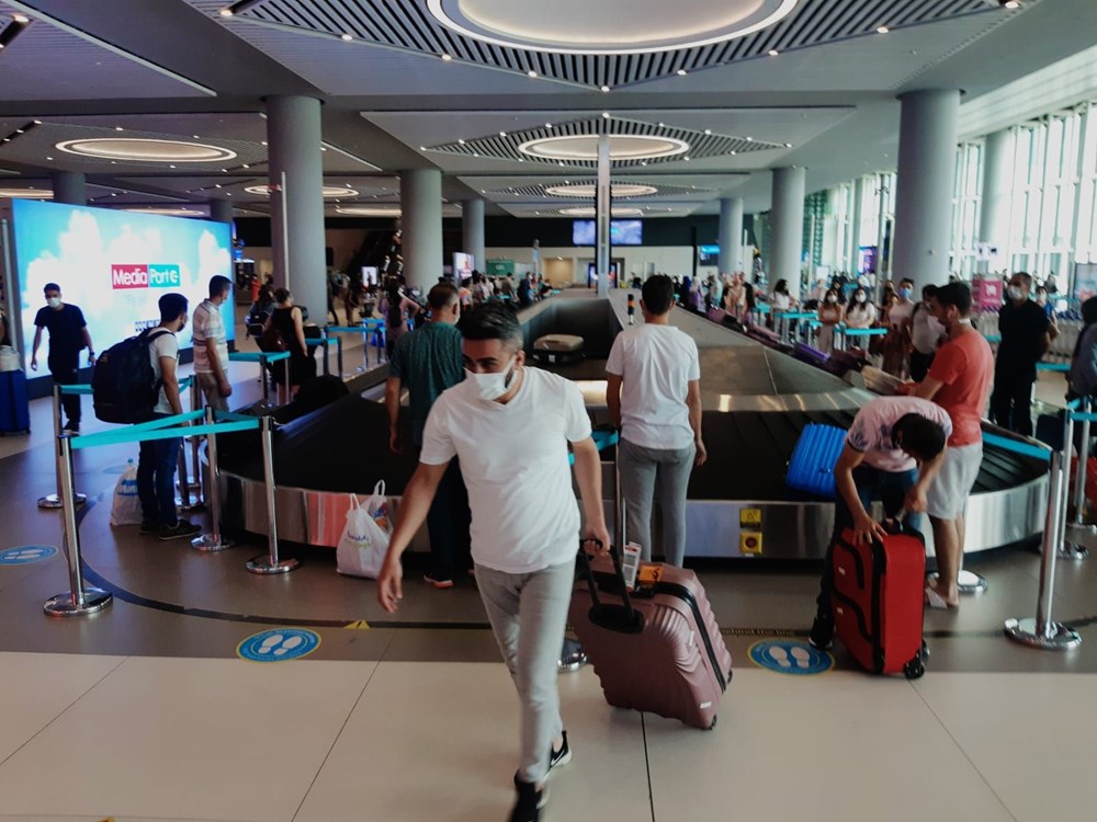 İstanbul'un havalimanlarında bayram dönüşü yoğunluğu: Pandemi döneminin rekoru bekleniyor - 12