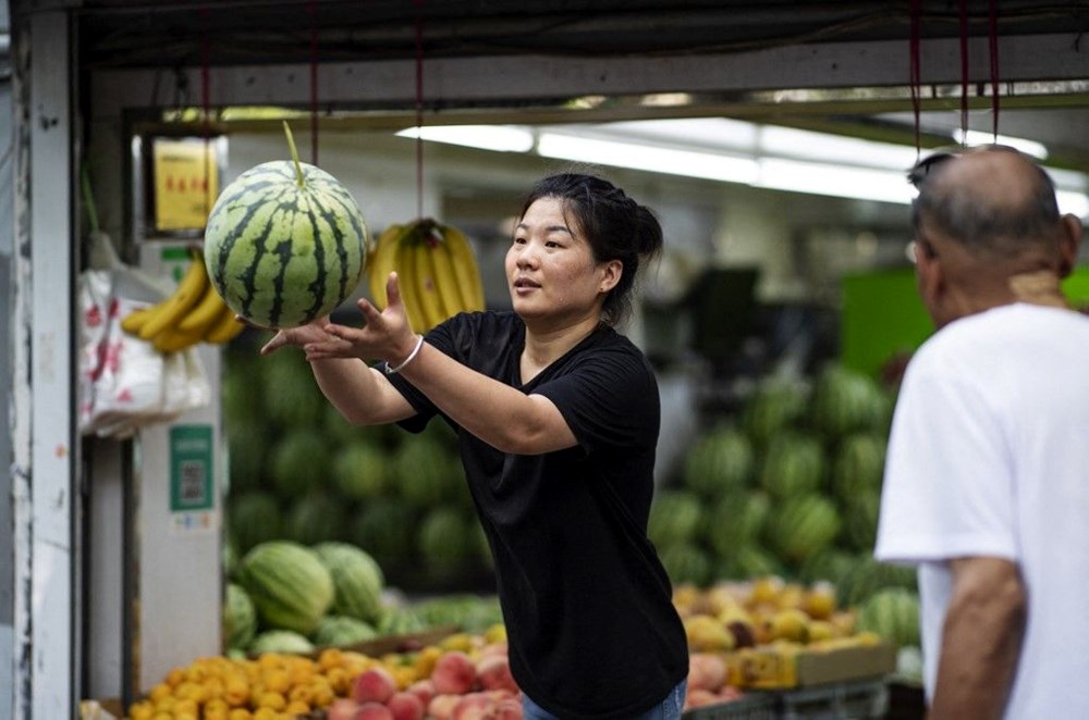 Çin'de emlak krizi: Müteahhitler karpuz, sarımsak ve şeftali karşılığında ev satmaya başladı - 5