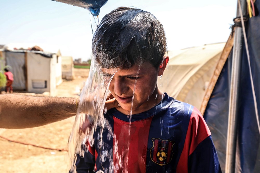 İdlib'deki kamplarda termometreler 50 dereceyi gösterdi: Hayatımızın en zor günlerinden - 3