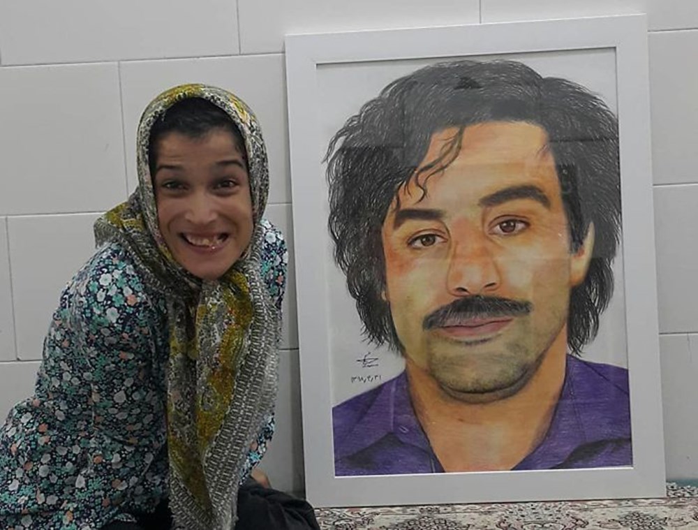 Iranian disabled painter draws pictures with his feet - 53