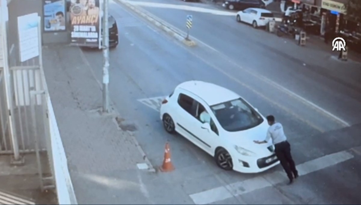 Güvenlik görevlisinin üzerine araç sürdü Güvenlik görevlisinin üzerine araç sürdü