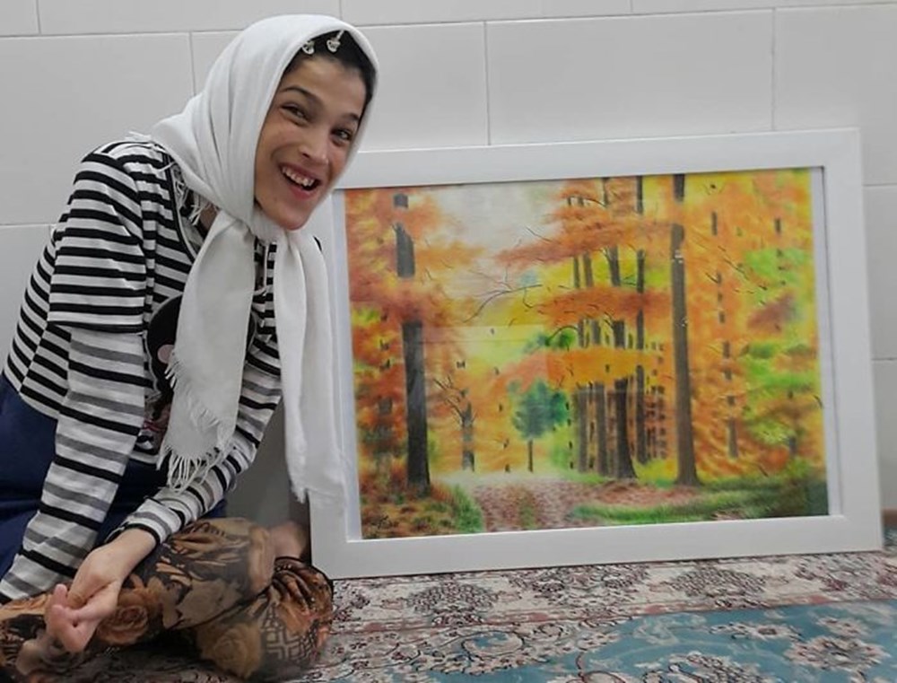 Iranian disabled painter draws pictures with his feet - 37