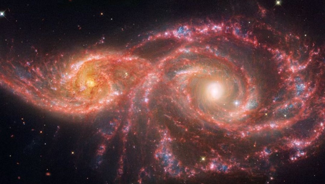 NASA’s Hubble and James Webb Telescopes Capture Stunning Merge of Galaxies NGC 2207 and IC 2163: A Cosmic Dance of Star Formation and Supermassive Black Hole Creation