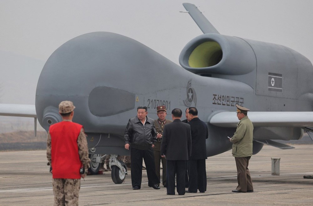 Kuzey Kore'den gövde gösterisi: Yeni uçağını ilk defa görücüye çıkardı - 4