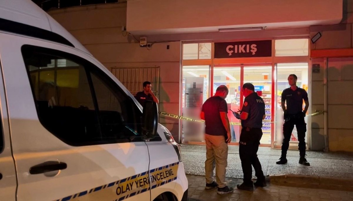 Markette kadını ve çocuğu vurdu