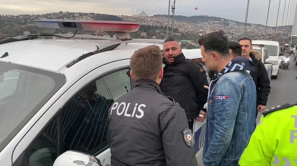 15 Temmuz Şehitler Köprüsü'nde hareketli dakikalar: Aracın üstüne çıkıp üstüne benzin döktü - 6
