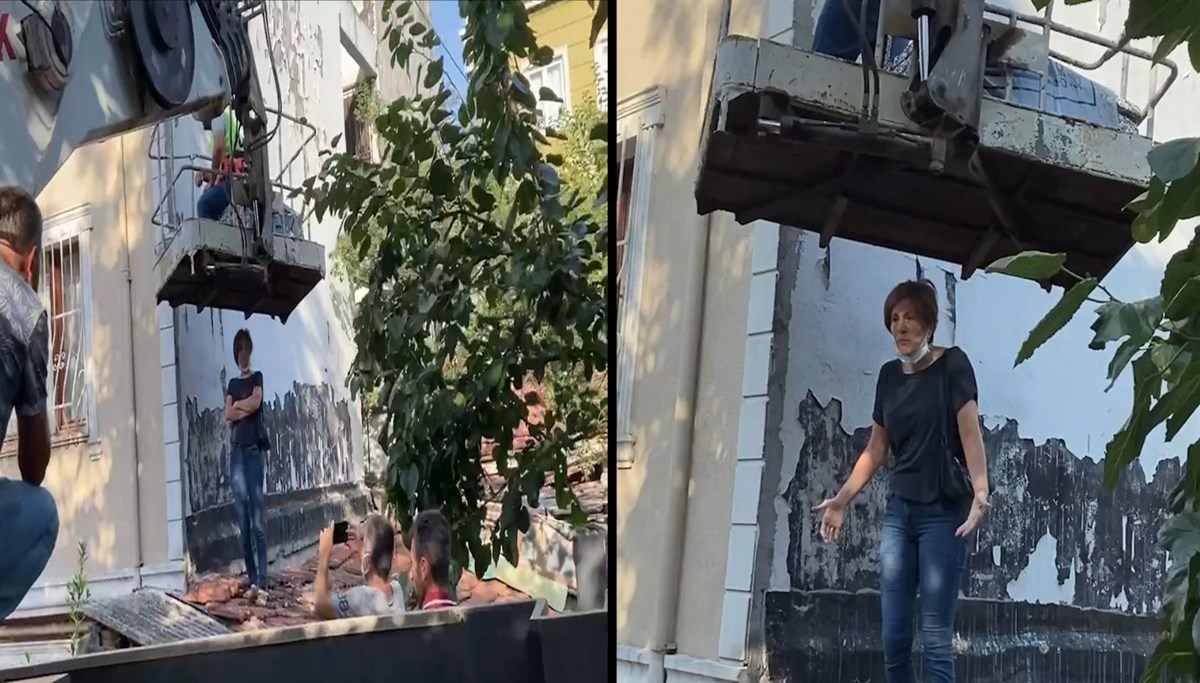 ‘Mantolama’ kavgası: Çatıya çıkıp vincin altına girdi