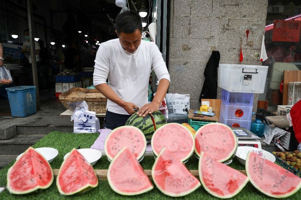 Çin'de emlak krizi: Müteahhitler karpuz, sarımsak ve şeftali karşılığında ev satmaya başladı - 3
