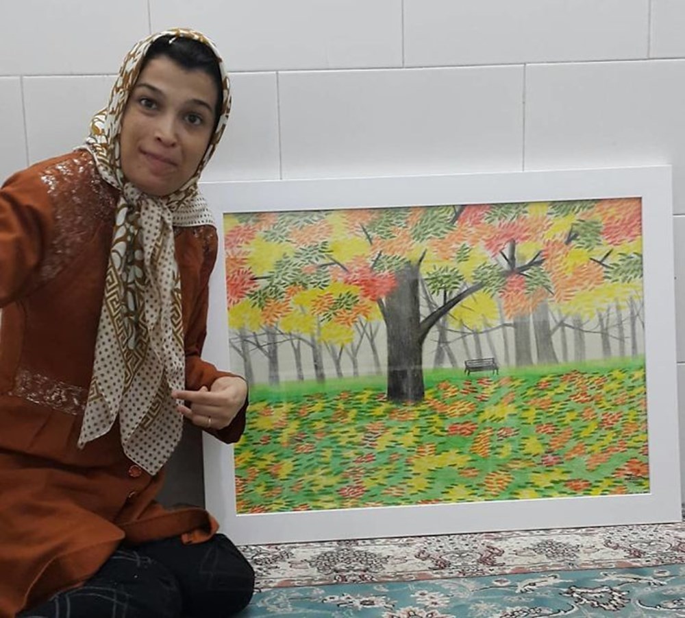 Iranian disabled painter draws pictures with his feet - 52