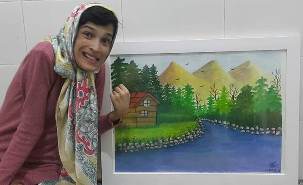 Iranian disabled painter draws pictures with his feet - 54