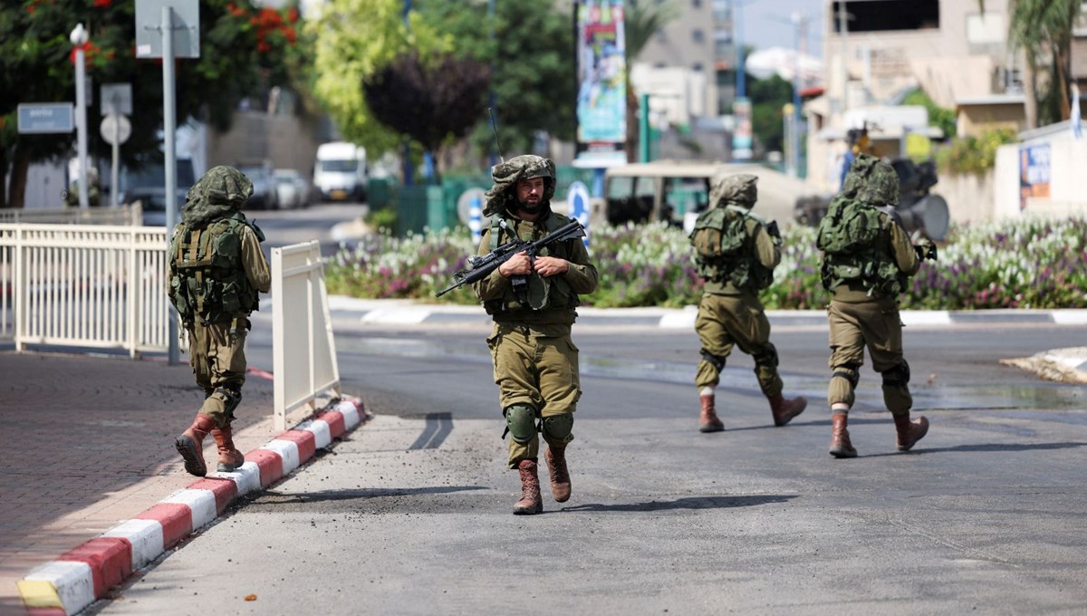 İsrail Hamas'ın bastığı sınır kentini boşaltıyor İsrail Hamas'ın bastığı sınır kentini boşaltıyor