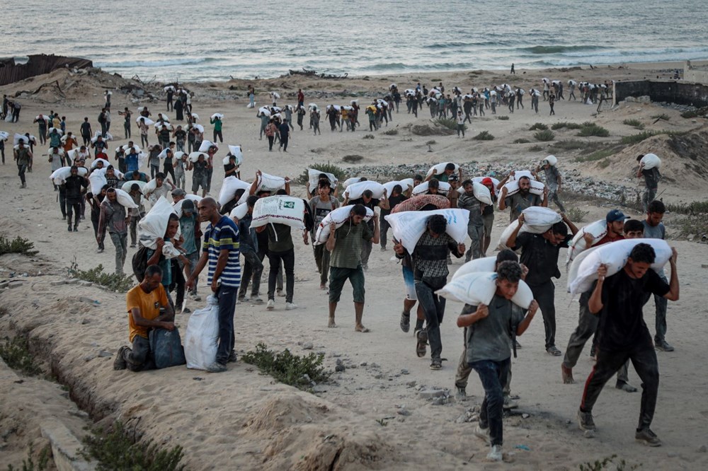 Gazze'de açlık savaşı: İsrail askeri, yemekleri toprağa gömmüş - 4