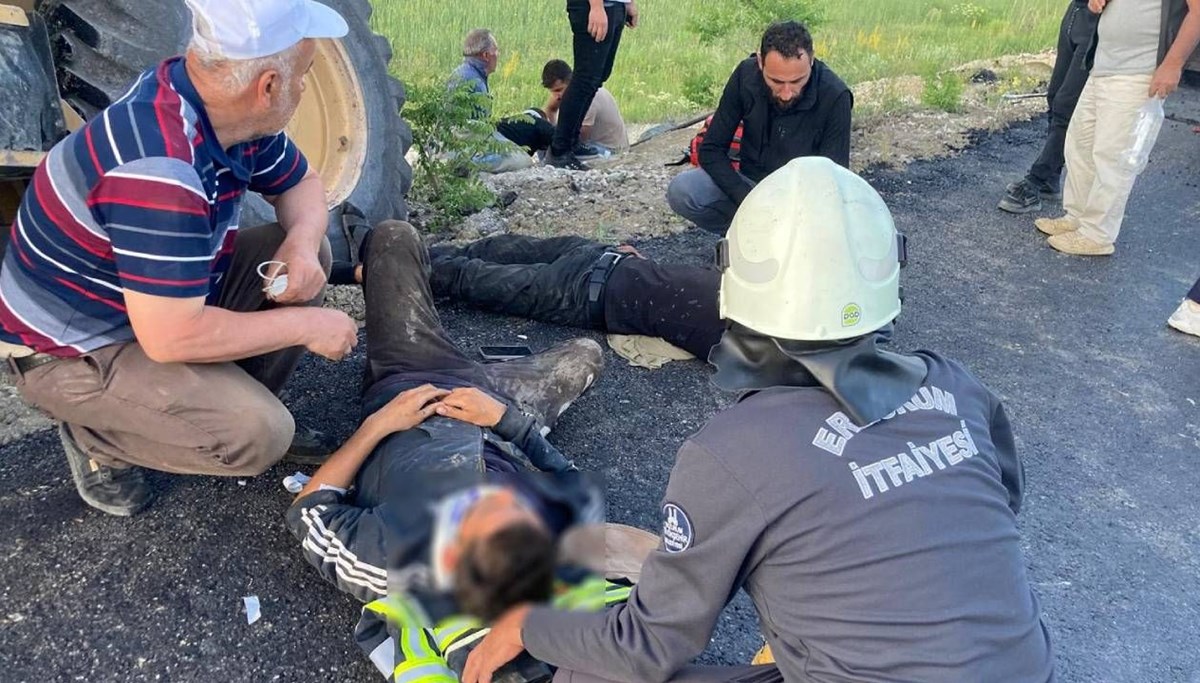 İş makinesi işçilerin arasına daldı İş makinesi işçilerin arasına daldı
