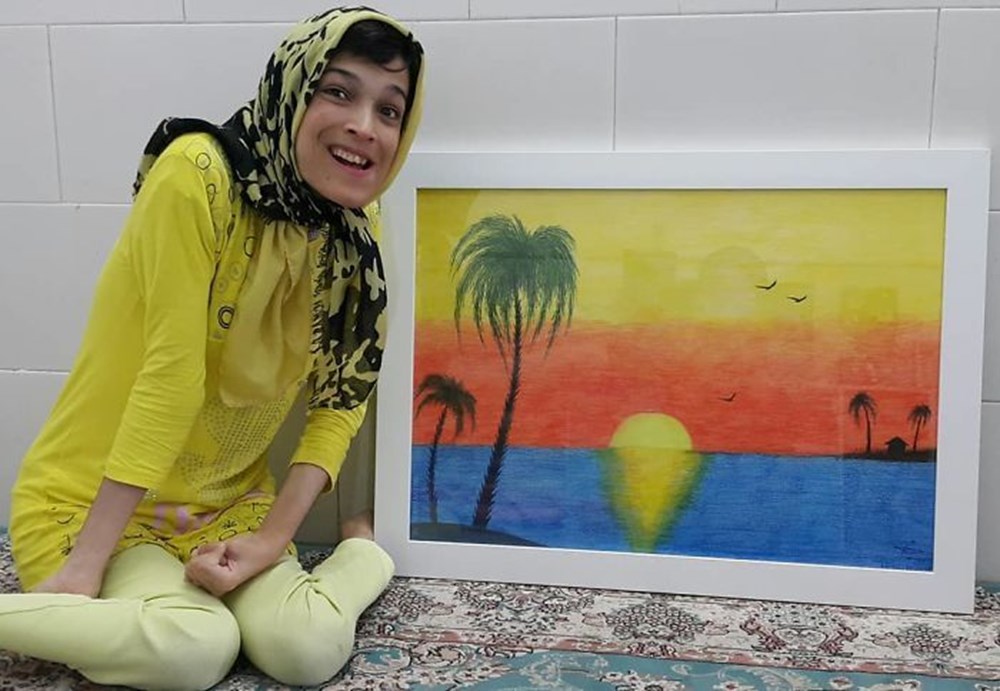 Iranian disabled painter draws pictures with his feet - 33