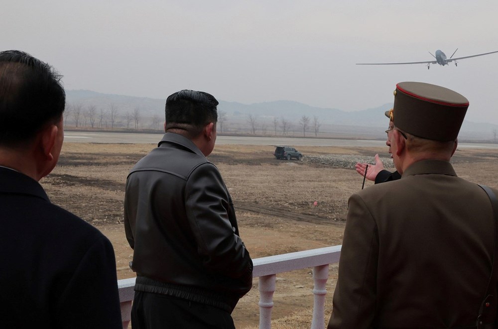 Kuzey Kore'den gövde gösterisi: Yeni uçağını ilk defa görücüye çıkardı - 5