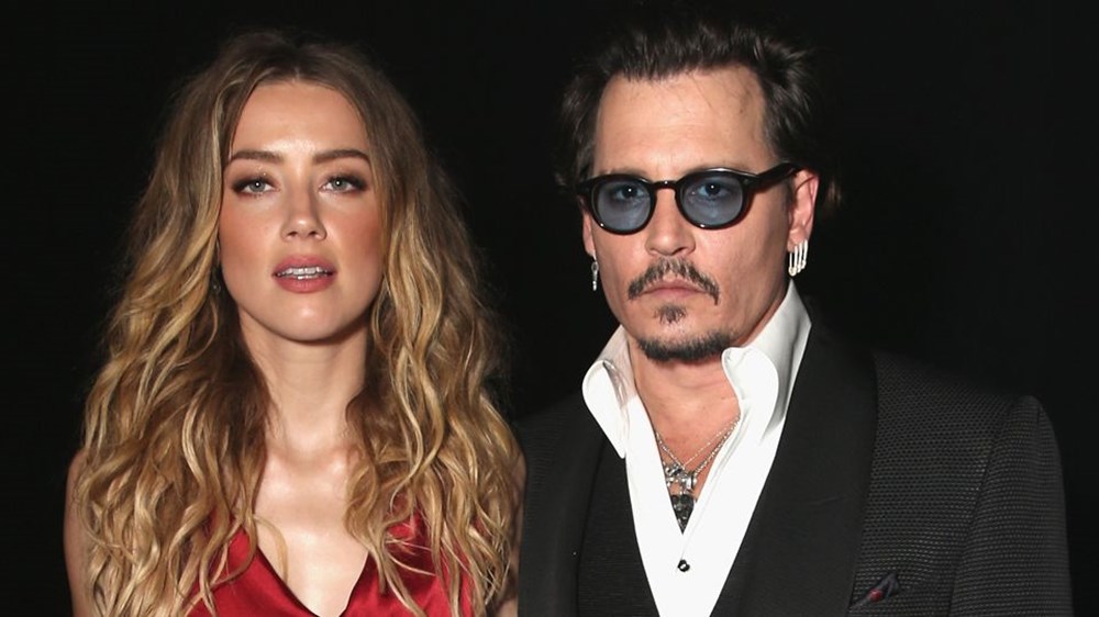 Amber Heard’den Johnny Depp’e yumruklu gönderme - 1