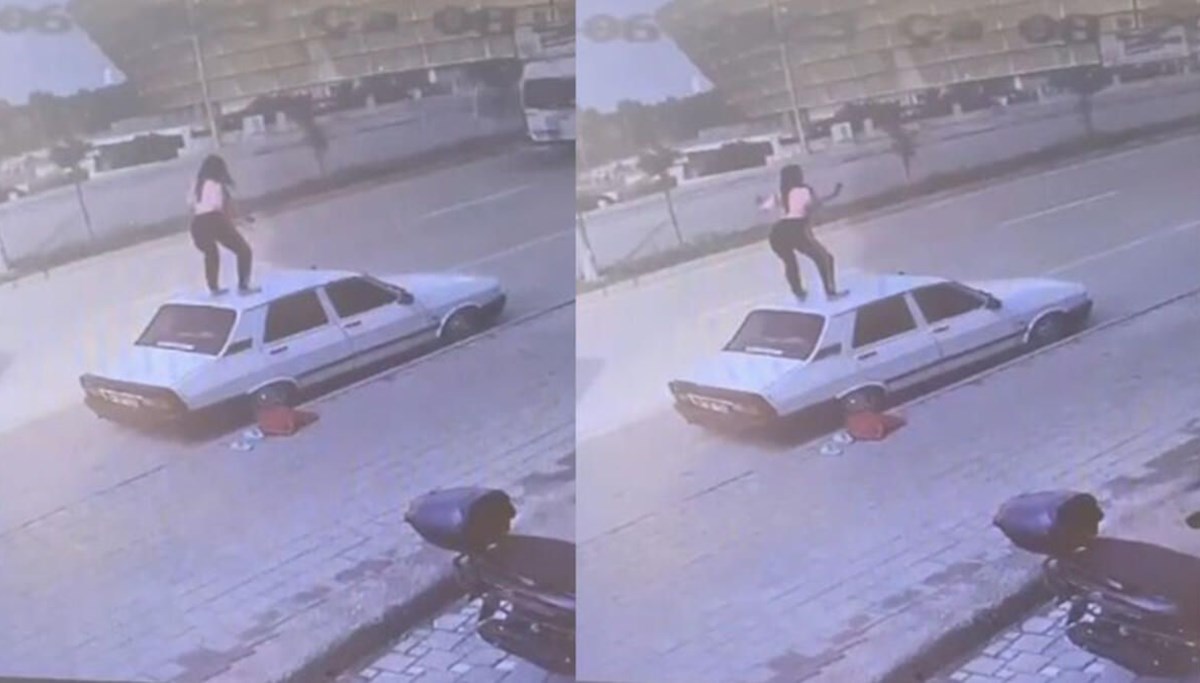 Park halindeki otomobilin tavanına çıkıp dans etti Park halindeki otomobilin tavanına çıkıp dans etti