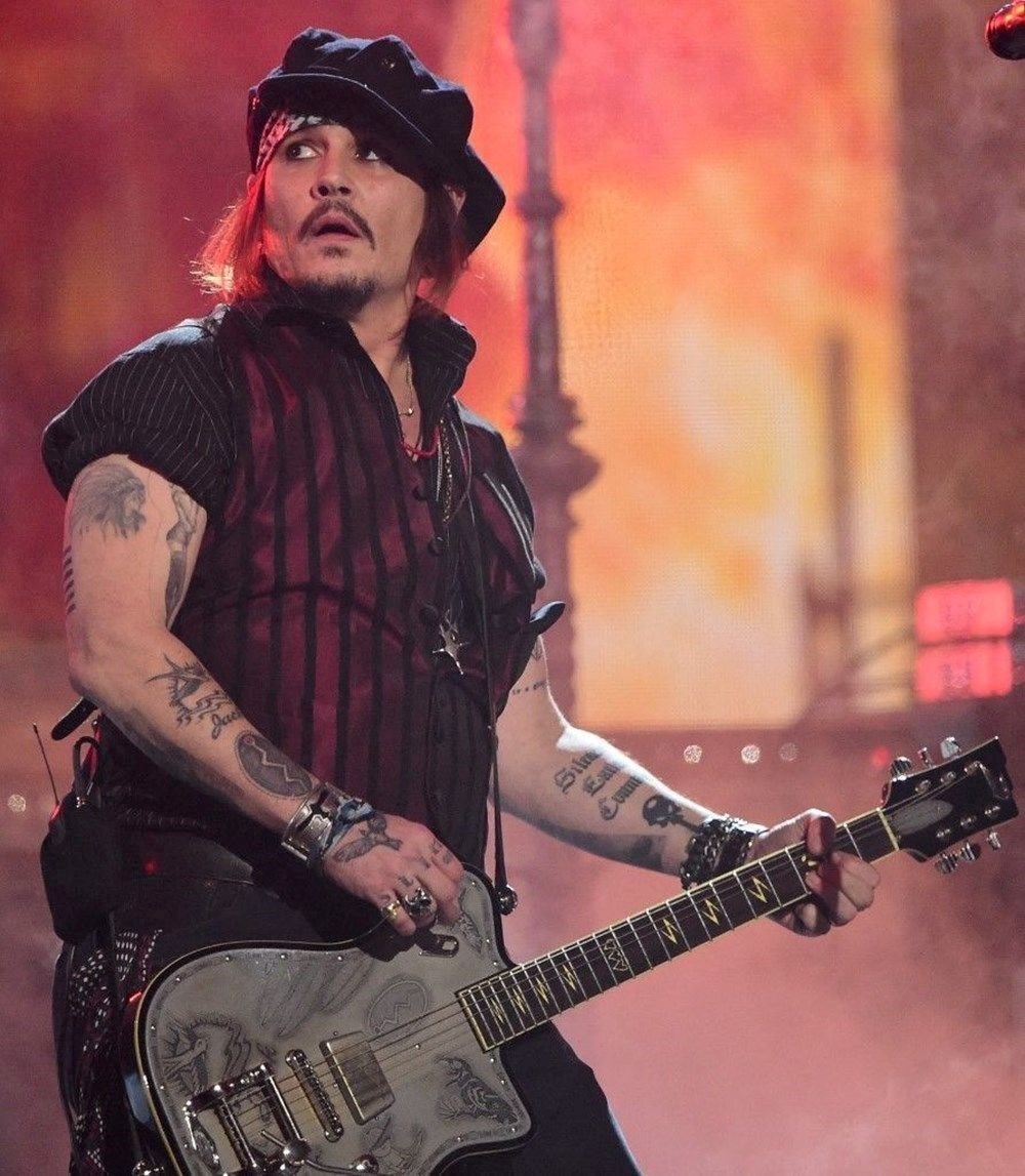 Amber Heard Johnny Depp'in tazminatını ödememek için alternatif yollara başvuruyor - 7