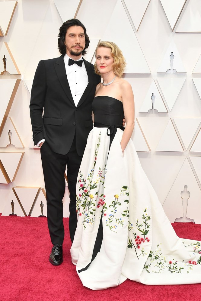 <p>Adam Driver (Suit: Burberry) and Joanne Tucker oscar red carpet</p>