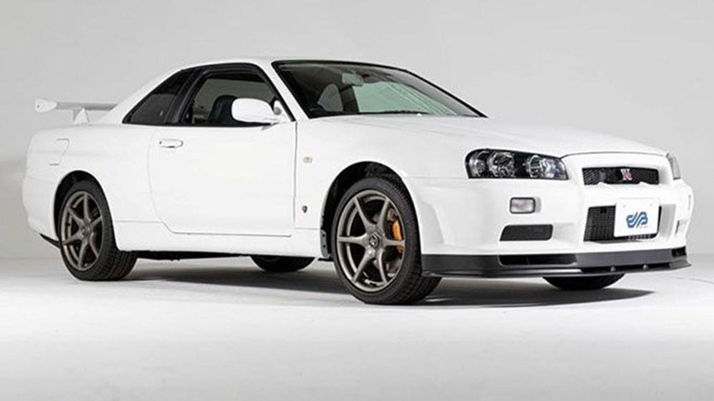 Nissan Skyline GT-R R34 V-Spec II Nur rekor fiyata satıldı(Sadece 10 kilometrede) - 1