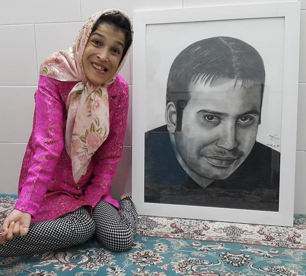 Iranian disabled painter draws pictures with his feet - 51