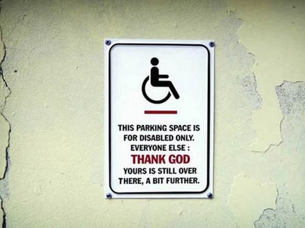 Still not over this. Parking Creative. Image of signs in advertisement. If you are not disabled and you Park here