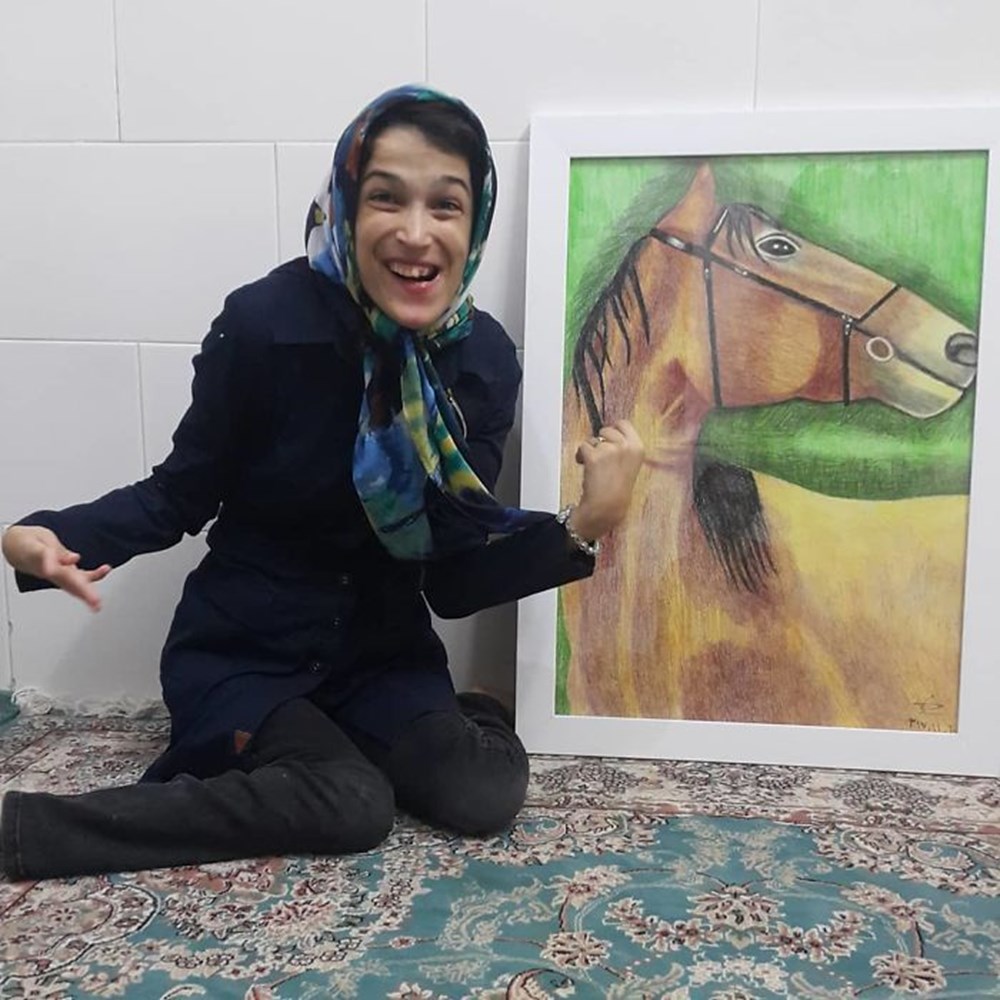 Iranian disabled painter draws pictures with his feet - 39