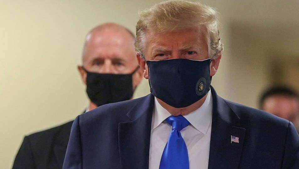 Trump salgının başından bu yana ilk kez maskeyle görüntülendi