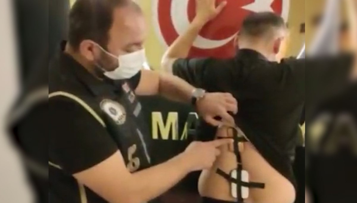 Ehliyet sınavında böyle yakalandı: Sırtından modem çıktı