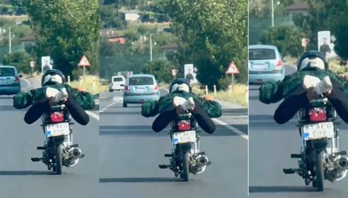 Motosikletini üzerine yatarak sürdü