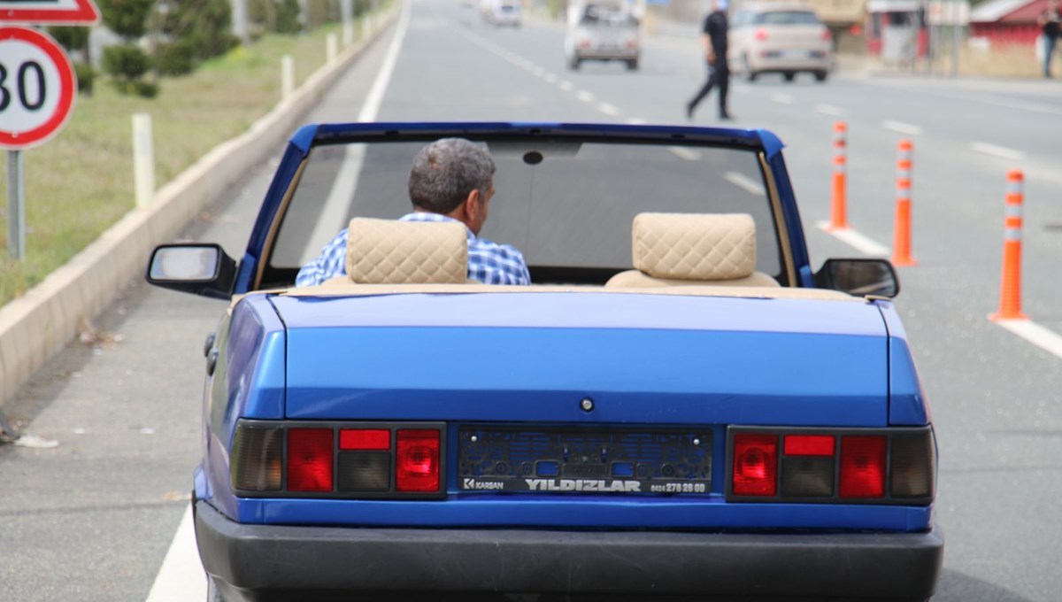 Hurdadan üstü açık otomobile Hurdadan üstü açık otomobile