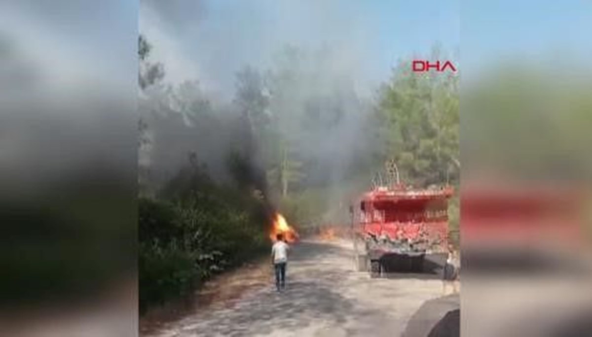 Seyir halindeki araçta yangın: Alevler ormana sıçradı Seyir halindeki araçta yangın: Alevler ormana sıçradı
