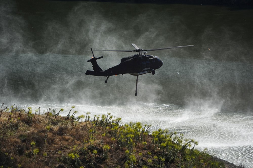 İzmir ve Antalya'da orman yangını: Çeşme'de otoyol kapandı, Lara'da alevler evlere yaklaştı, Ödemiş'te bir kişi can verdi - 7