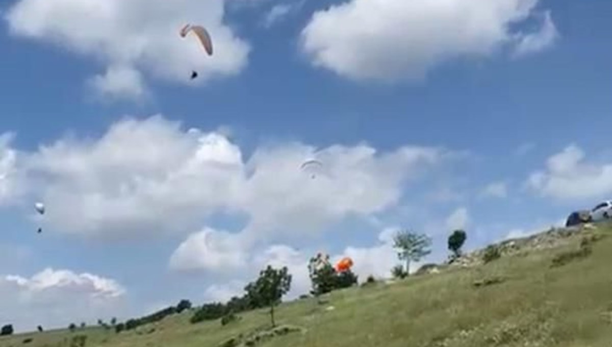 İpleri dolanan yamaç paraşütleri yere çakıldı: Ölü ve yaralılar var İpleri dolanan yamaç paraşütleri yere çakıldı: Ölü ve yaralılar var