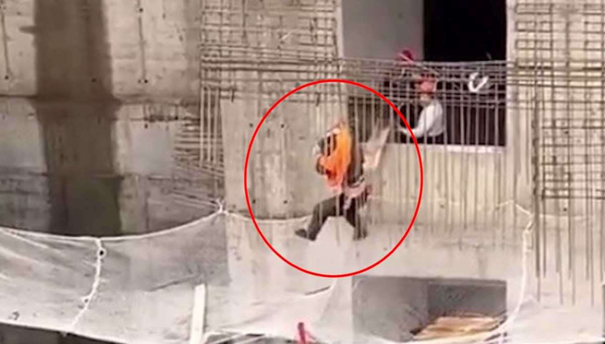 Metrelerce yükseklikten düşüyordu, binanın demirlerine takılarak kurtuldu