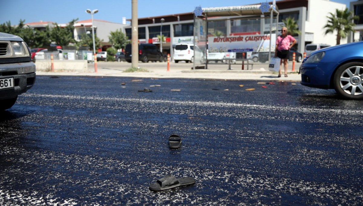 Asfalt eridi terlikler yola yapıştı