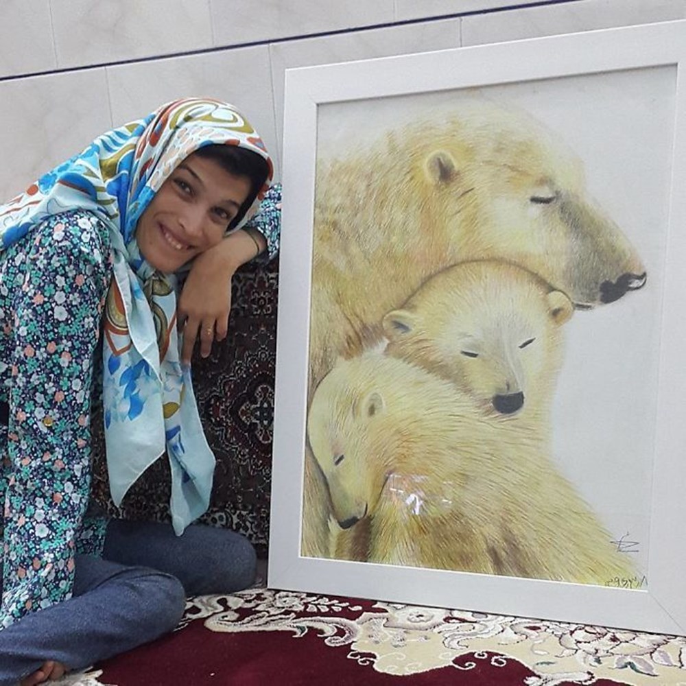 Iranian disabled painter draws pictures with his feet - 1