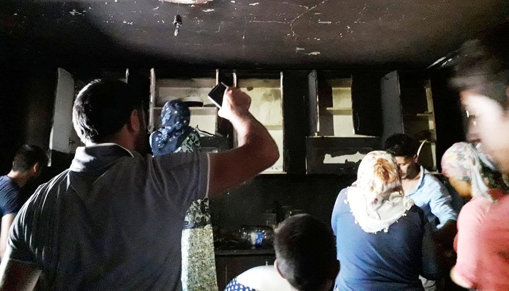 Patlayan buzdolabı yangın çıkardı: Çocuklarını kurtarmak için pencereden attı - 5