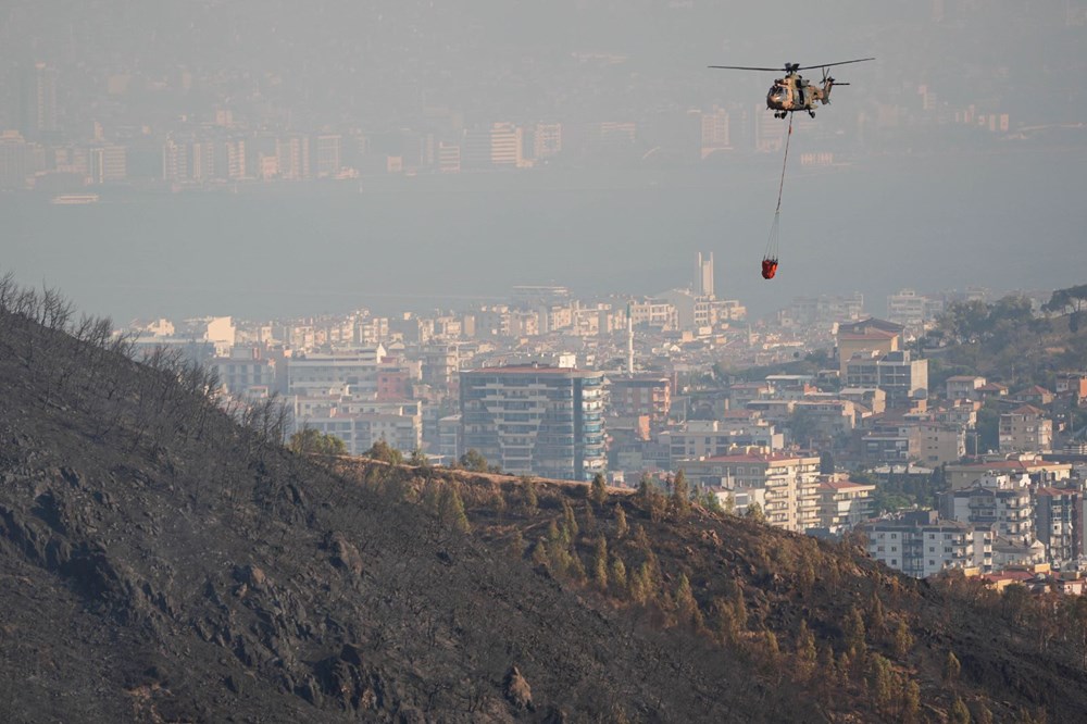 İzmir,
Aydın ve Bolu’da felaketin boyutunu gözler önüne seren fotoğraflar: İzmir’de geniş
bir alan küle döndü, 43 binada ağır hasar var - 5