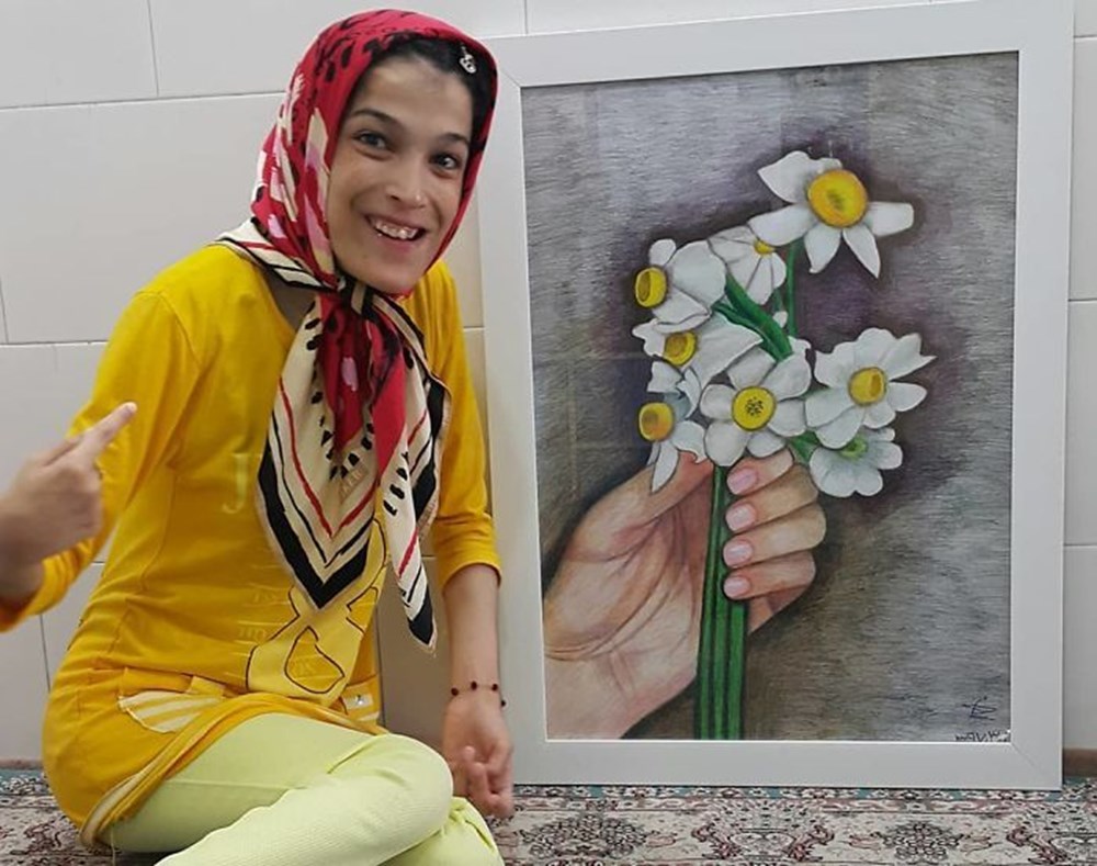 Iranian disabled painter draws pictures with his feet - 32