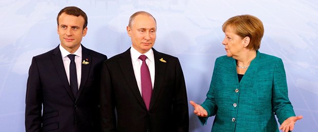 macron merkel putin.jpg