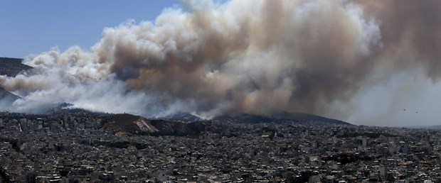 2015-07-17T121830Z_317500548_GF10000162067_RTRMADP_3_GREECE-FIRE.JPG
