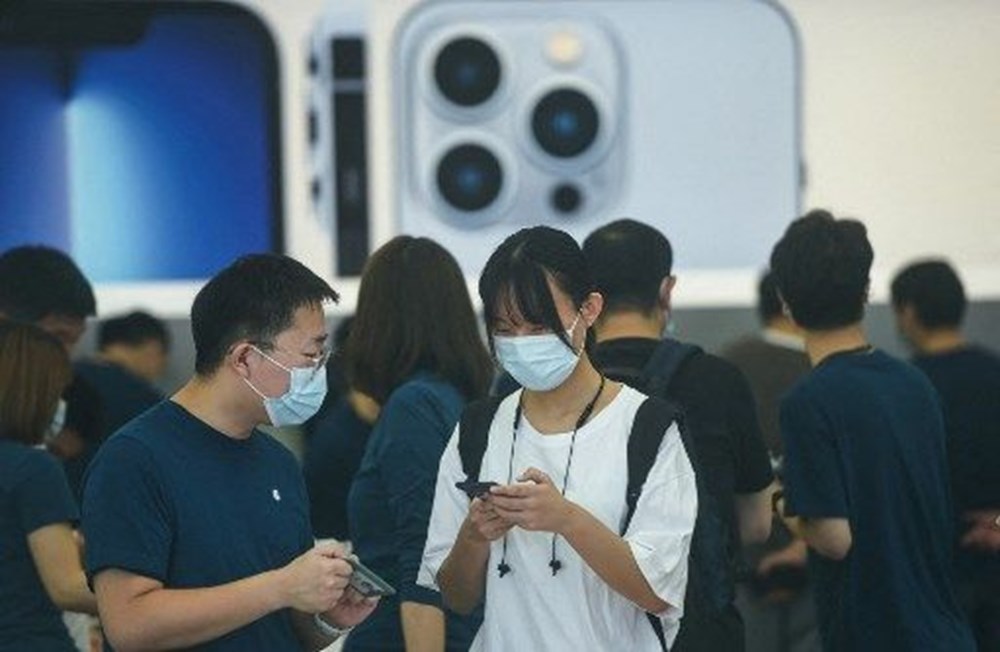 iPhone 13 satışta: Dünyanın dört bir yanında Apple tutkunları
yeni iPhone için kuyruğa girdi - 10