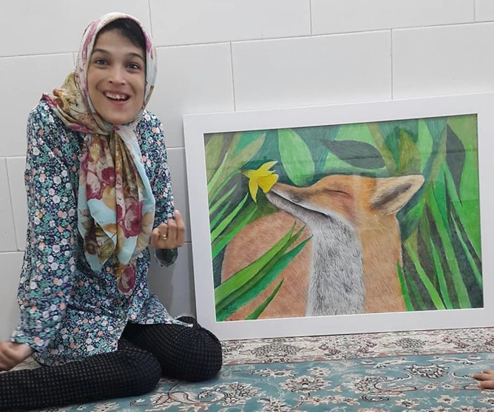 Iranian disabled painter draws pictures with his feet - 12