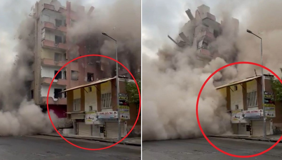 Ağır hasarlı bina yıkım sırasında yanındaki evin üzerine devrildi Ağır hasarlı bina yıkım sırasında yanındaki evin üzerine devrildi